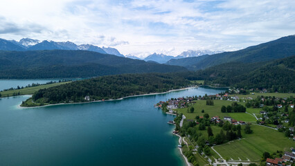 Breathtaking Aerial View of Lake and Mountains Captured on a Clear Day in Bavaria