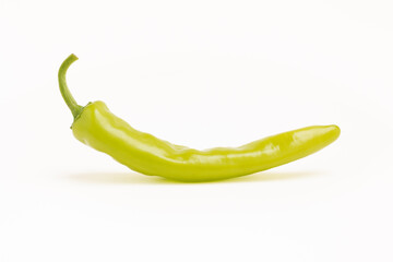 Close-up of green pepper on white background