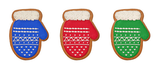 Christmas cookies. Three gingerbread cookies in the shape of a mitten isolated on a white background.