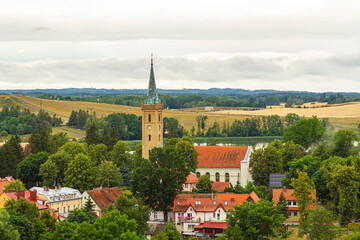 Kościół Ewangelicki w Mikołajkach w pochmurny dzień | The Evangelical Church in Mikołajki on a cloudy day