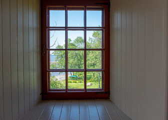 Fototapeta premium View on a lake and trees from a window