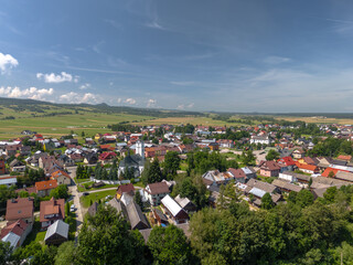 Summer skyline cityscape of Frydman village at Czorsztyn lake (Jezioro Czorsztyńskie) in Lesser Poland (Małopolska). Aaerial view
