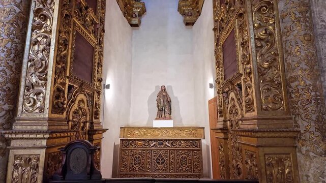 Interior view at the Charola of the Convent of Christ, magnificent Knights Templar architecture, round church altar, paintings and very peculiar ornaments, Tomar Portugal