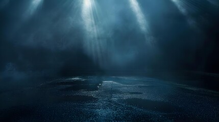 Urban scene of dark street with wet asphalt and reflections of rays