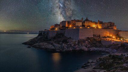Fototapeta premium View of the Citadel of Calvi on Corsica by night, France - Travel concept for magazines, websites, banners, cards, ...