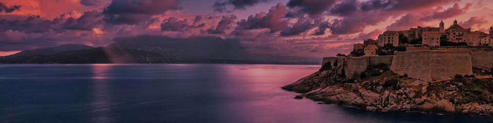 panoramic view of Calvi, Corsica at sunset