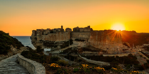 Obraz premium Landscape with Bonifacio at sunset time, Corsica island, France - travel concept for magazines, banners, cards, websites, ...