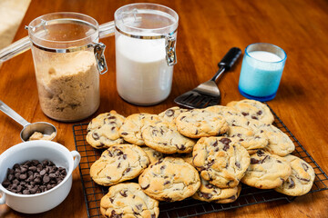 Fresh batch of homemade chocolate chip cookies, selective focus.