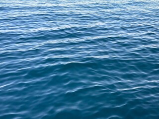 Blue water calm rippled surface background