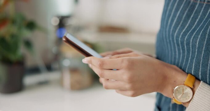 Hands, woman and typing in coffee shop with phone for social media, communication and mobile app review. Waiter, smartphone and working for cafe website, online delivery and customer loyalty program