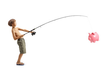 Obraz premium Boy fishing and catching a piggy bank with a fishing rod