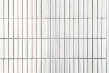 a pattern of vertical and horizontal iron lines in a wall