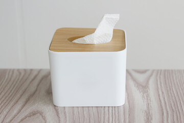 wooden tissue box on wooden table