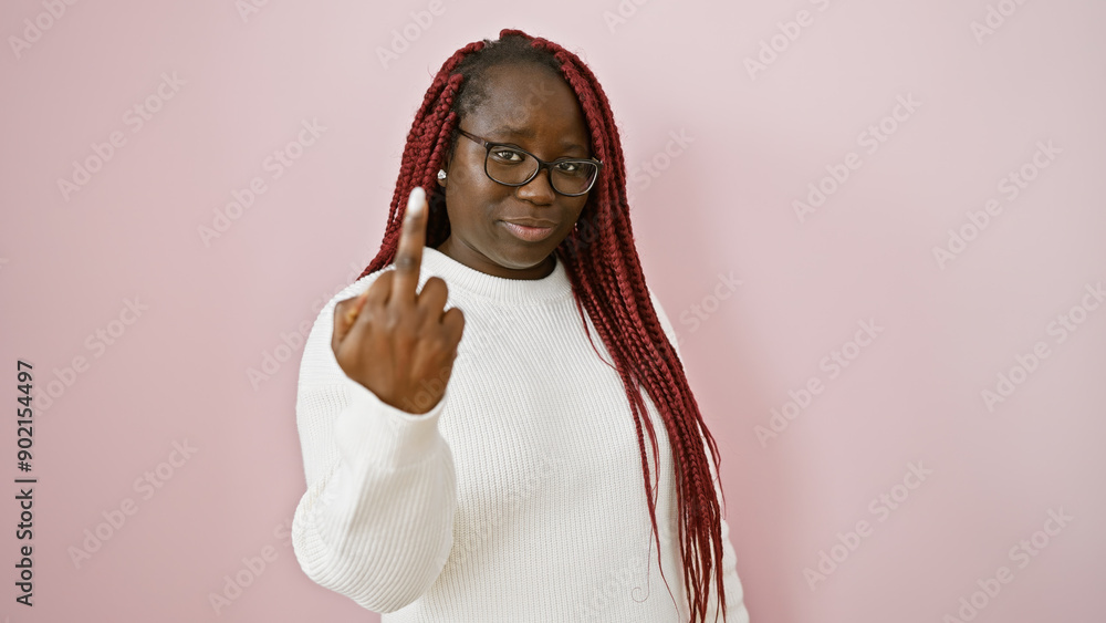 Sticker a confident black woman with braids making a gesture with her middle finger against a pink backgroun