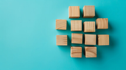 Wooden blocks connected together on a blue background. Teamwork concept