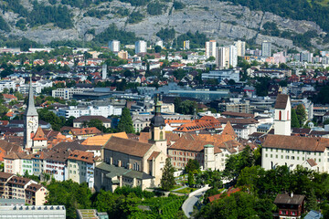 Aerial view of Chur townscape overlooking reformed church of St. Martin and Catholic Cathedral on...