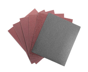 Sheets of sandpaper isolated on white, top view