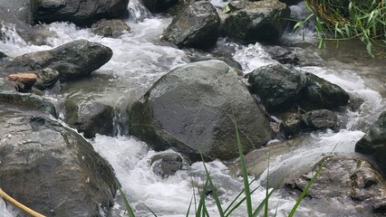 water flowing over rocks