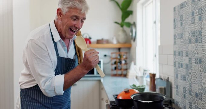 Funny, home and senior man cooking, hobby and healthy meal with fun and prepare dinner. Mature person, kitchen and pensioner with utensils and ingredients with singing and happy with a smile and joy