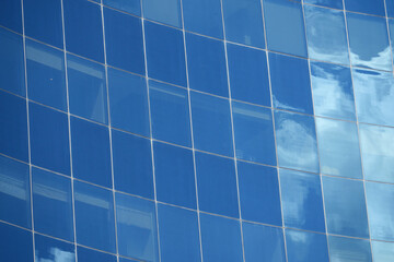 Fototapeta premium This is an abstract reflection created on a blue tiled surface that brings serenity and elegance