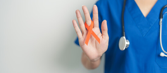 Doctor with Orange Ribbon for Leukemia, Kidney cancer day, world Multiple Sclerosis, CRPS, Self...