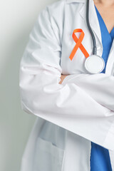 Doctor with Orange Ribbon for Leukemia, Kidney cancer day, world Multiple Sclerosis, CRPS, Self...