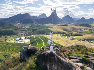 Aerial drone view of a telecommunication tower providing vital communication services to the rural...
