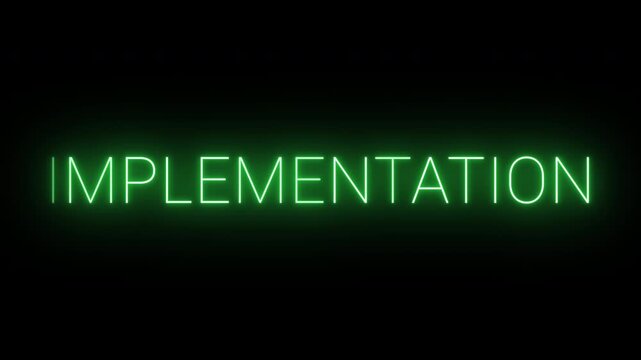 4K flickering neon green implementation sign on black background