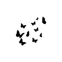Flying butterflies silhouettes. Flock of butterflies on white background. Vector design element.