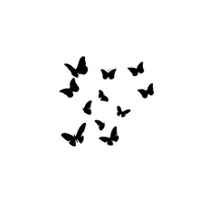 Flying butterflies silhouettes. Flock of butterflies on white background. Vector design element.
