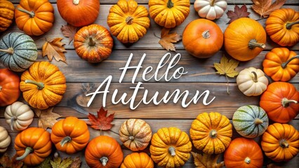 Hello Autumn Pumpkins and Fall Leaves on Rustic Wooden Background.
