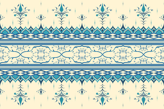 An elegant traditional floral pattern featuring intricate blue and turquoise designs on a beige background. Perfect for use in textiles, wallpapers, and decorative projects