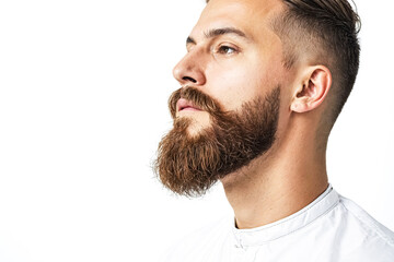 Obraz premium Close-up of a Man with a Beard Looking Upward