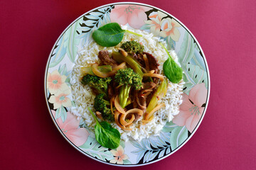 Mongolian lamb with vegetables and steamed long grain rice. 