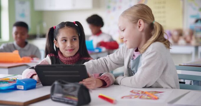 School kids, girls and tablet for teamwork in classroom with online app, discussion or digital learning in school. Creative children or students with tech, creative development and gamified education