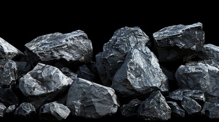 A pile of dark, wet rocks of various sizes against a black background. The rocks are all different shapes and have a rough, textured surface.
