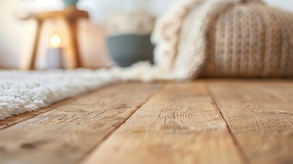 Elegant wood flooring complements cozy textiles and warm lighting in a stylish living room