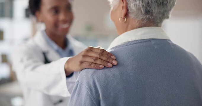 Doctor, hand on shoulder and senior woman with advice in clinic for appointment, wellness and elderly care. Female people, help and patient as medic, staff or support in hospital for routine check up