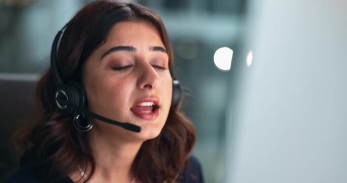 Call center, computer and smile with business woman in office at night for tech support or solution. Contact, customer service or help and happy telemarketing employee with headset in crm workplace