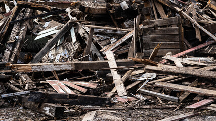 Wooden debris of a destroyed house. 
