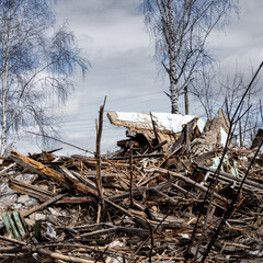 Wooden debris of a destroyed house. 