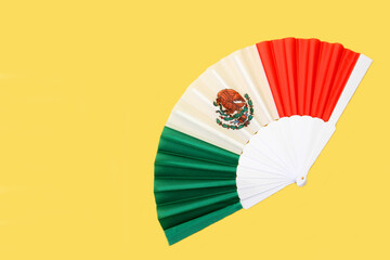 Tricolor fan with the colors of the Mexican flag as a decorative item, the flag of Mexico national to celebrate holidays of Independence Day and Revolution Day