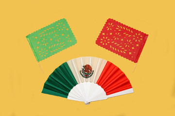 Tricolor fan with the colors of the Mexican flag as a decorative item, the flag of Mexico national to celebrate holidays of Independence Day and Revolution Day
