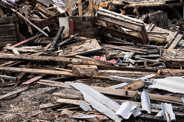 Wooden debris of a destroyed house. 