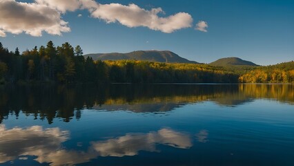 Fototapeta premium The peaceful lake surface enhanced by the gentle glow of a winter sunset