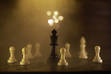 Strategic Chess Game With Black King Surrounded by Pawns in Mysterious Lighting