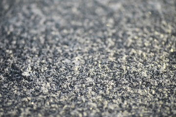 Close-Up of Frost Crystals on a Surface Showcasing Winter's Intricate Beauty and Natural Ice Patterns