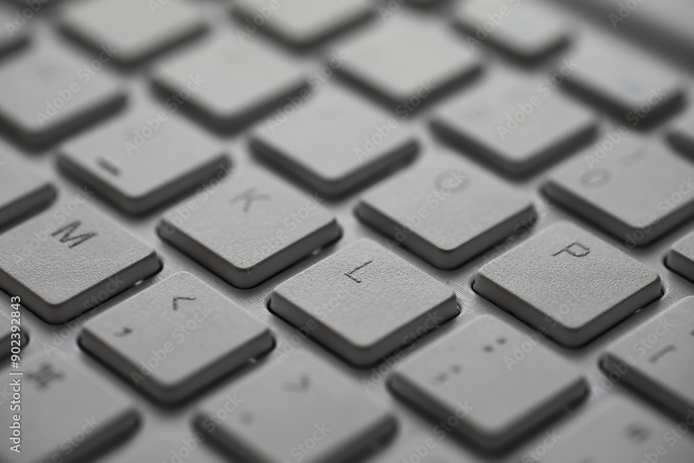Aufkleber close-up of modern grey keyboard keys with selective focus and minimalist design