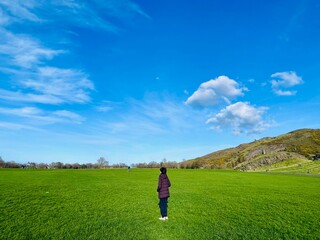 child running on the meadow