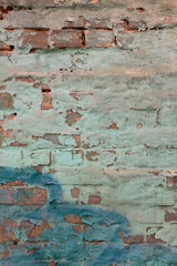 multilayer plastered and painted brick wall background